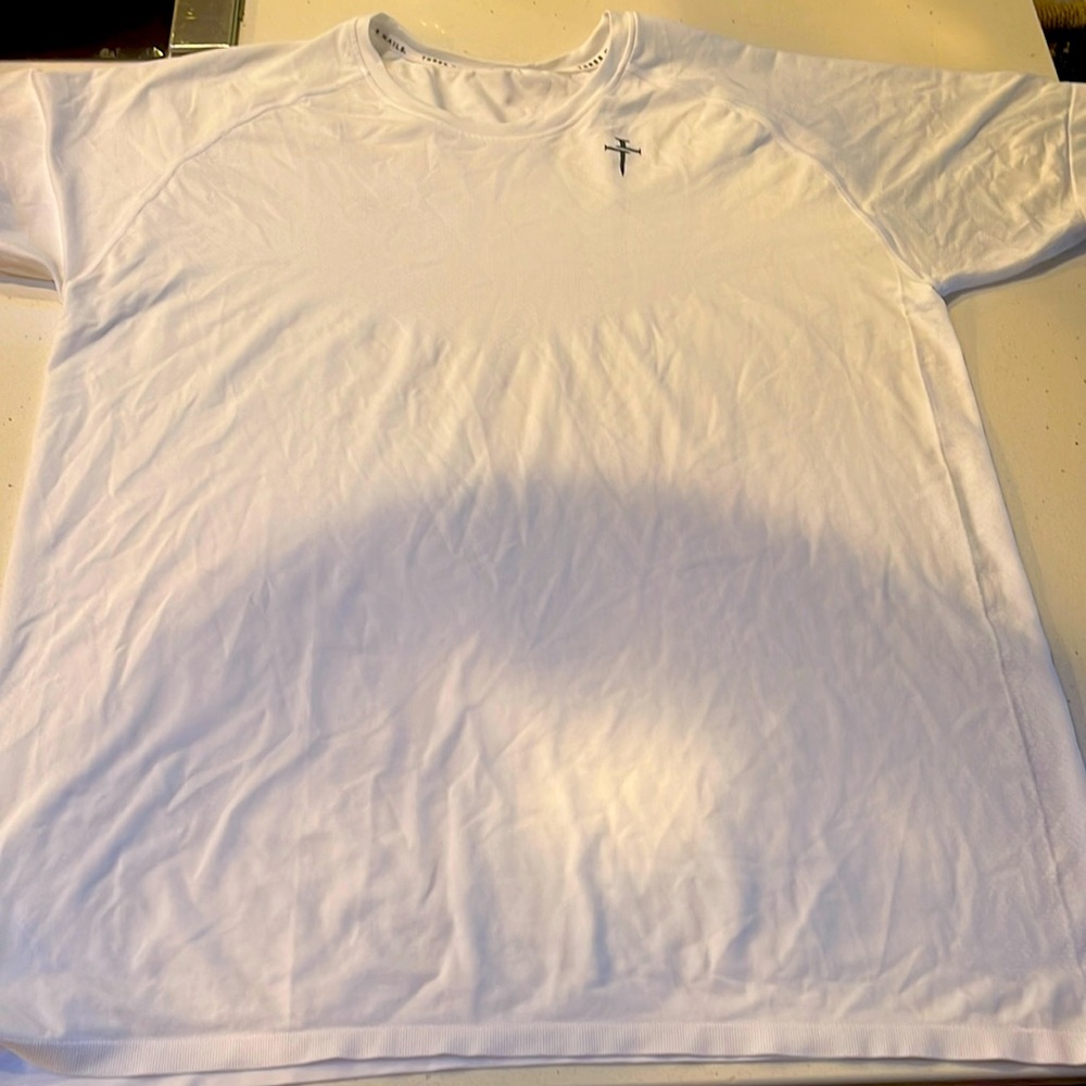 Selling white cross tee